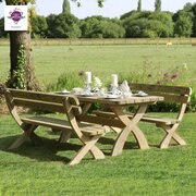 Harriet 6 Seater Dining Set in a garden environment